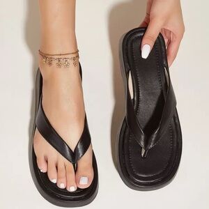 Trendy Black Platform‎ Flip Flop Sandals – Sleek Elevated Summer Comfort.